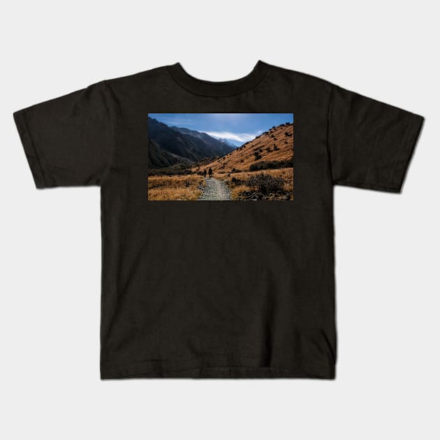 Tramping Through Mackenzie Country Kids T-Shirt by krepsher